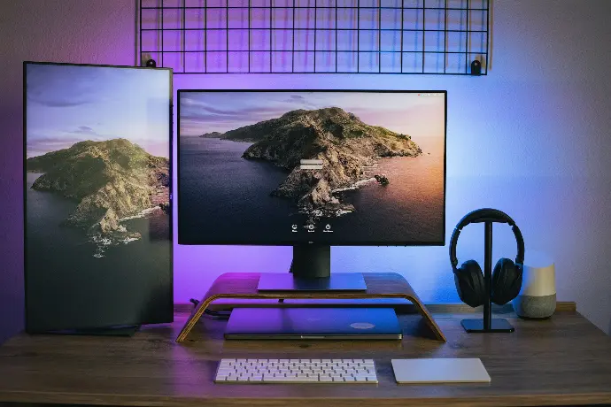 black and gray laptop computer on brown wooden table